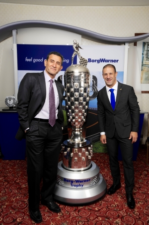 Jamal Farhat (Left) with the BorgWarner Championship Driver's Trophy and Tony Kanaan, winner of the 2013 Indianapolis 500