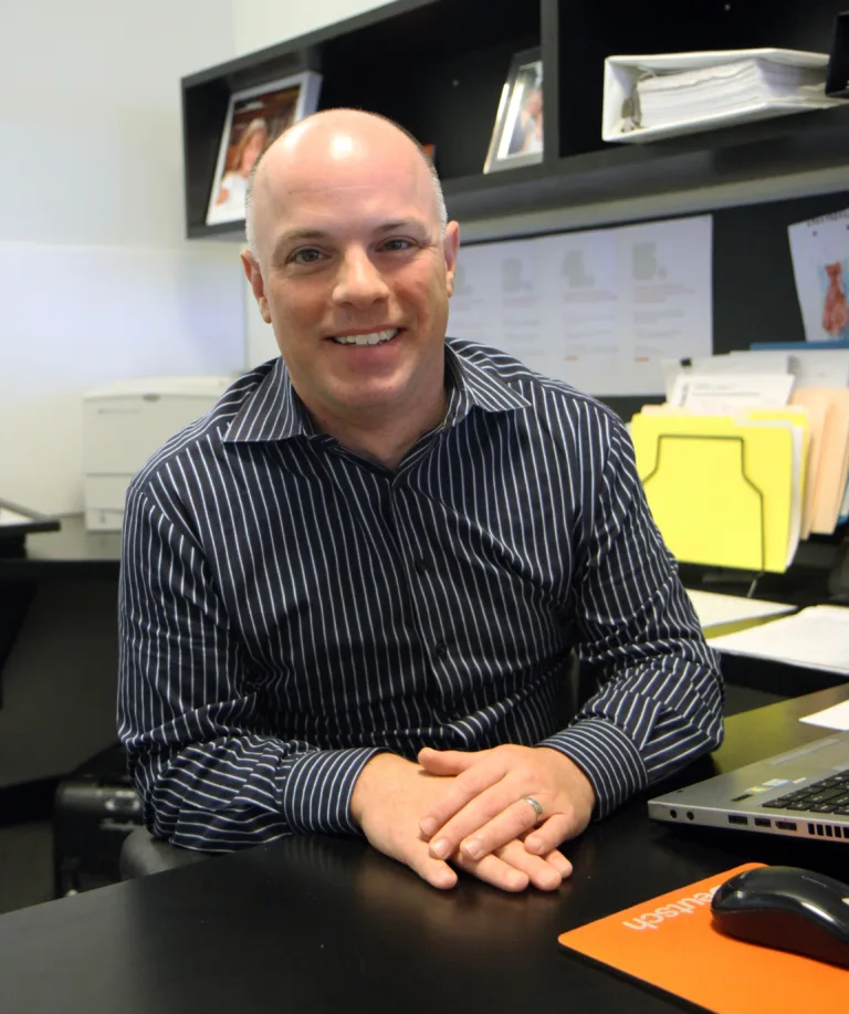 Bob Maloney at his desk