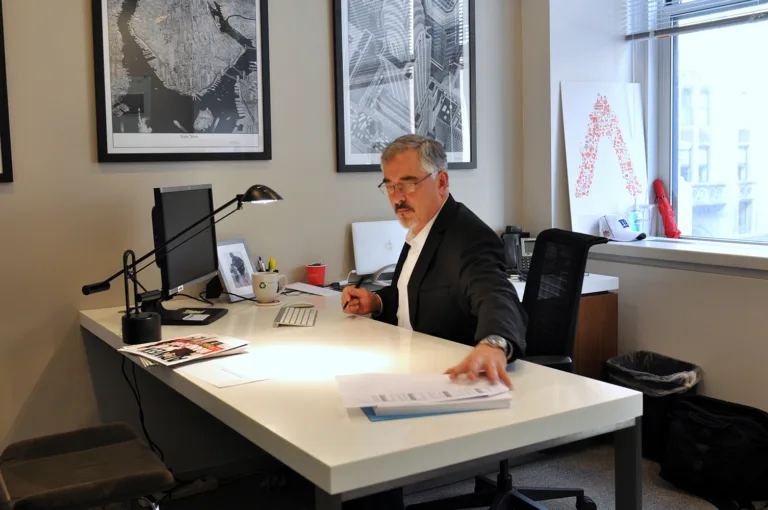 Joe Tomasulo CFO at desk